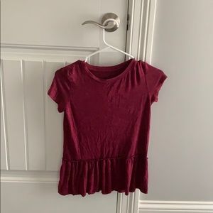 A maroon shirt